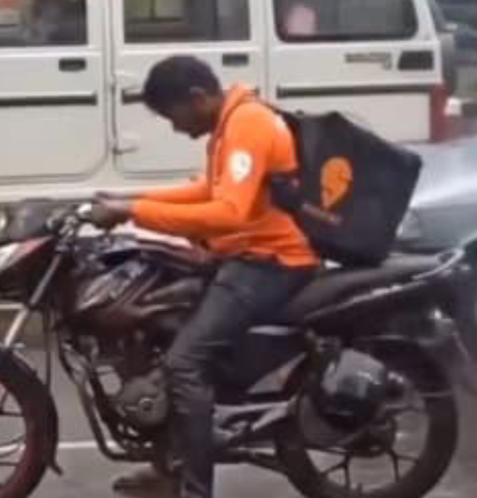 Swiggy Delivery Agent Gets Drenched in Heavy Rain – Viral Video Tugs at Heartstrings