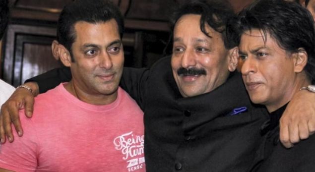 Baba Siddique with actors Salman Khan and Shah Rukh Khan during an Iftar party, in Mumbai.(PTI file photo)