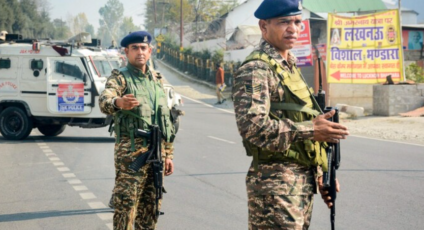 Security personnel stand guard during a search operation on Srinagar-Ladakh highway on Monday. (Photo: PTI)